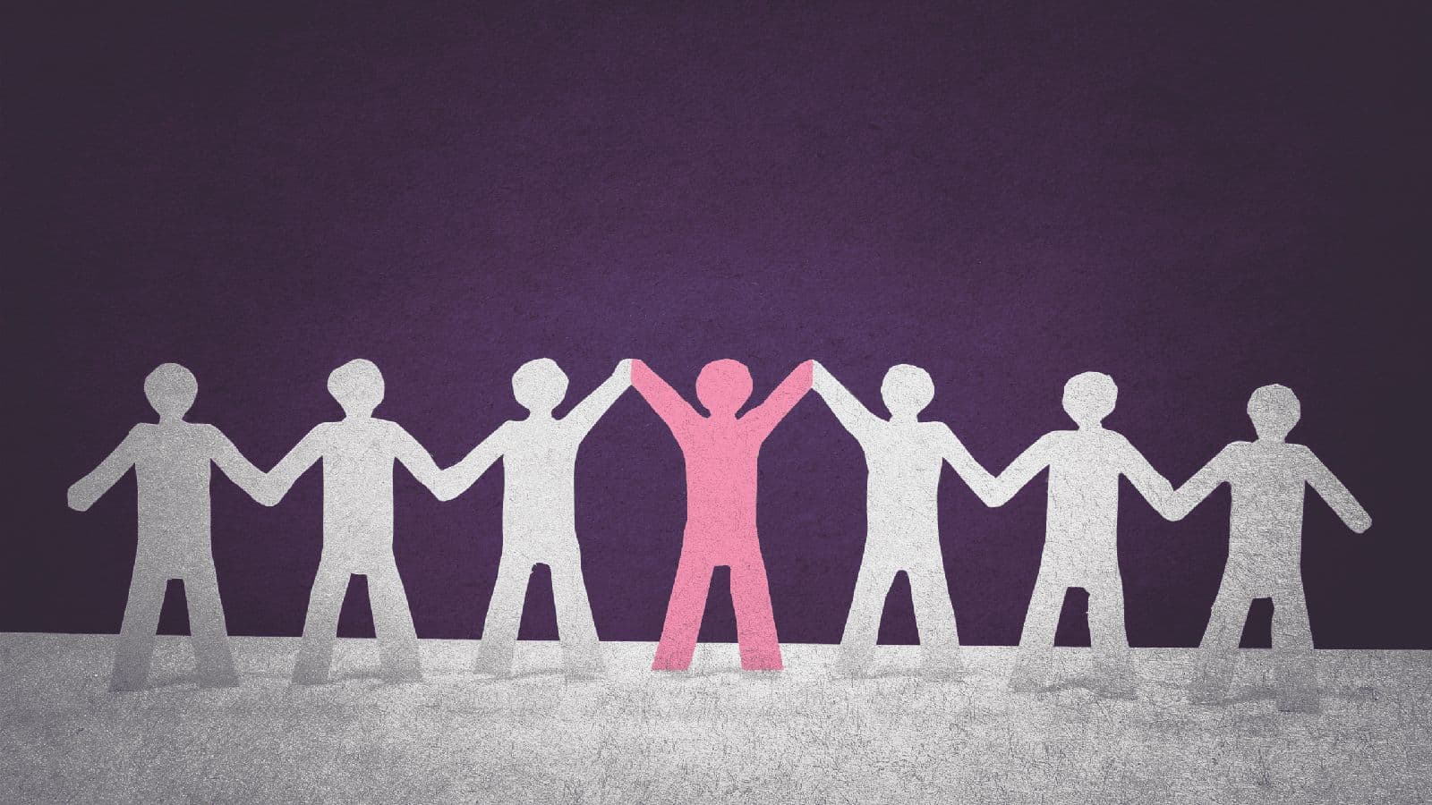 Paper cut-out figures holding hands, with one pink figure raising its arms above the white figures to stand out as a leader.