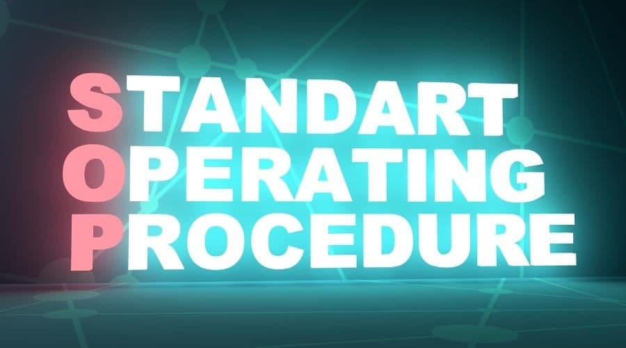 Neon sign reading Standard Operating Procedure with the letters S, O, and P highlighted.