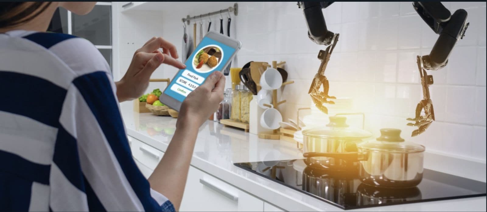 A customer orders from a tablet menu in a kitchen as a robotic arm tends pots on the stove.
